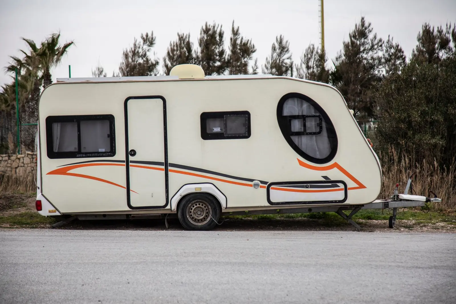 Caravan parked outdoors.
